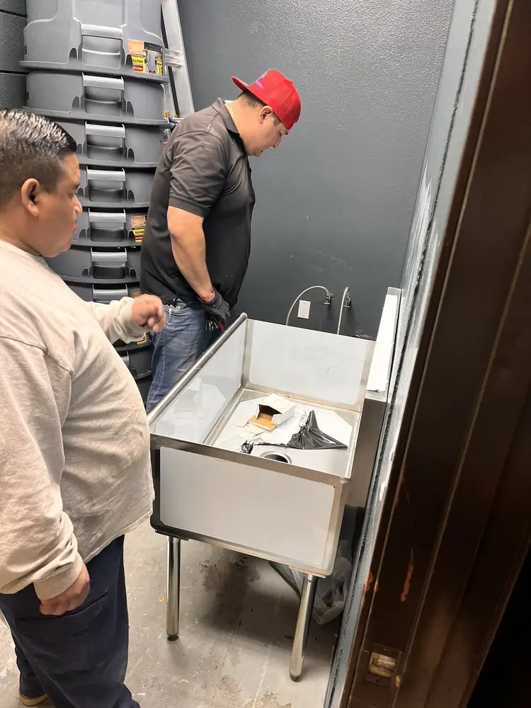 Commercial plumbing and sink installation in Evans